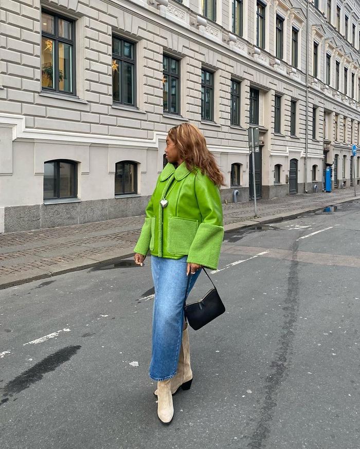 6 cool transitional outfits: @nnennachem wearing a statement jacket and denim skirt